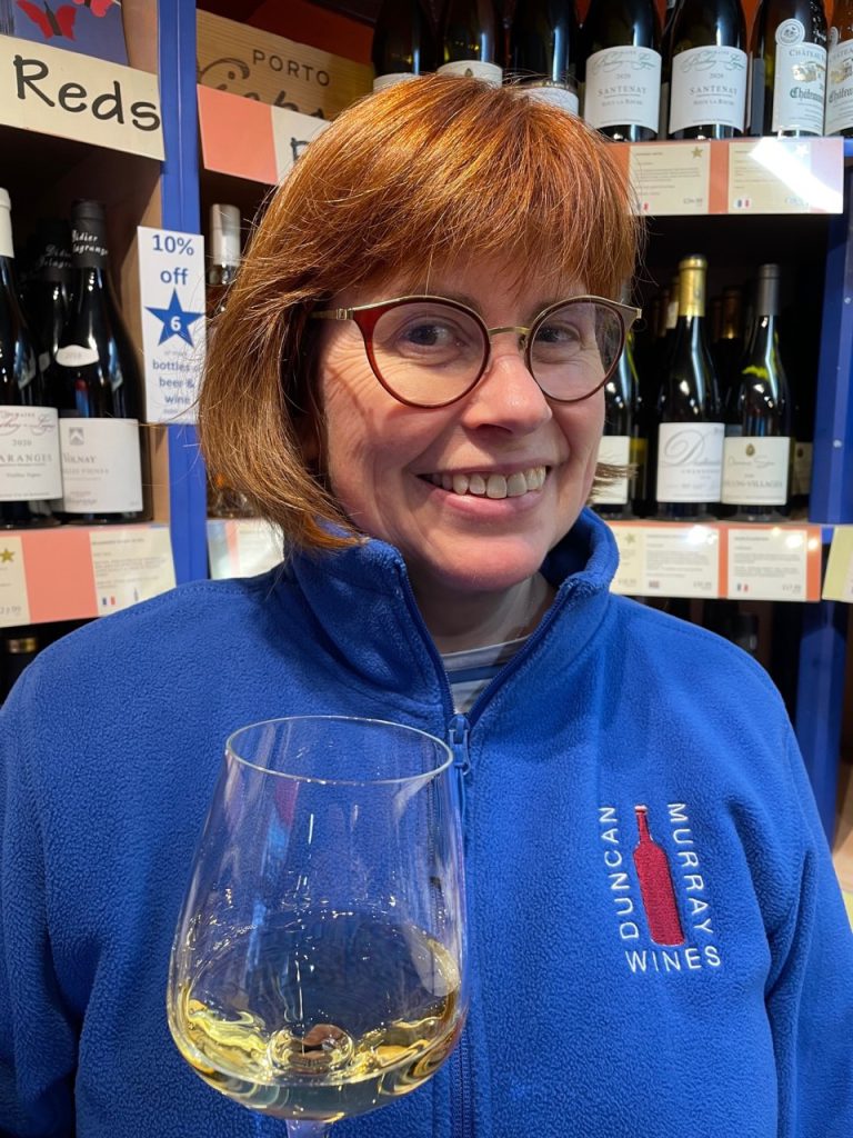 Megan holding a glass of one of Duncan Murray Wines most wondrous wines