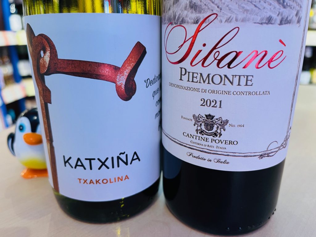 Photo shows Katxina Txakolina white wine and Sibane red wine