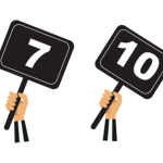 Images shows hands holding score cards